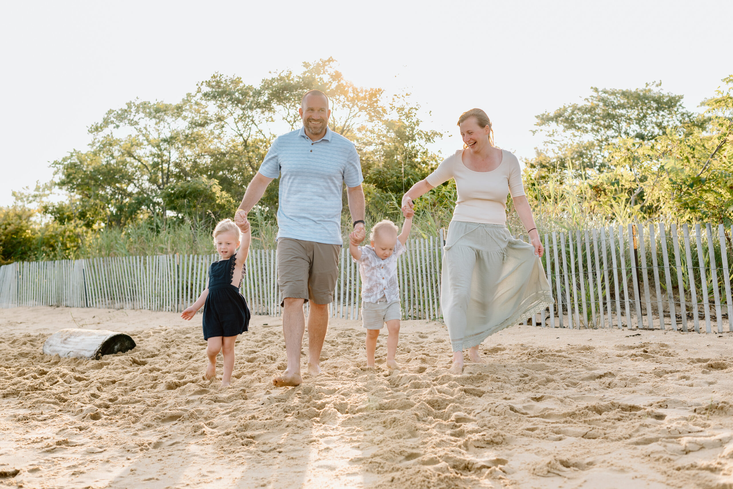 family laughing have a stress-free family session in Annapolis, Maryland