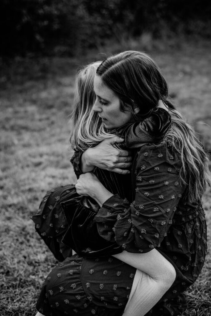 candid moment with mom and daughter stress-free family photography Annapolis