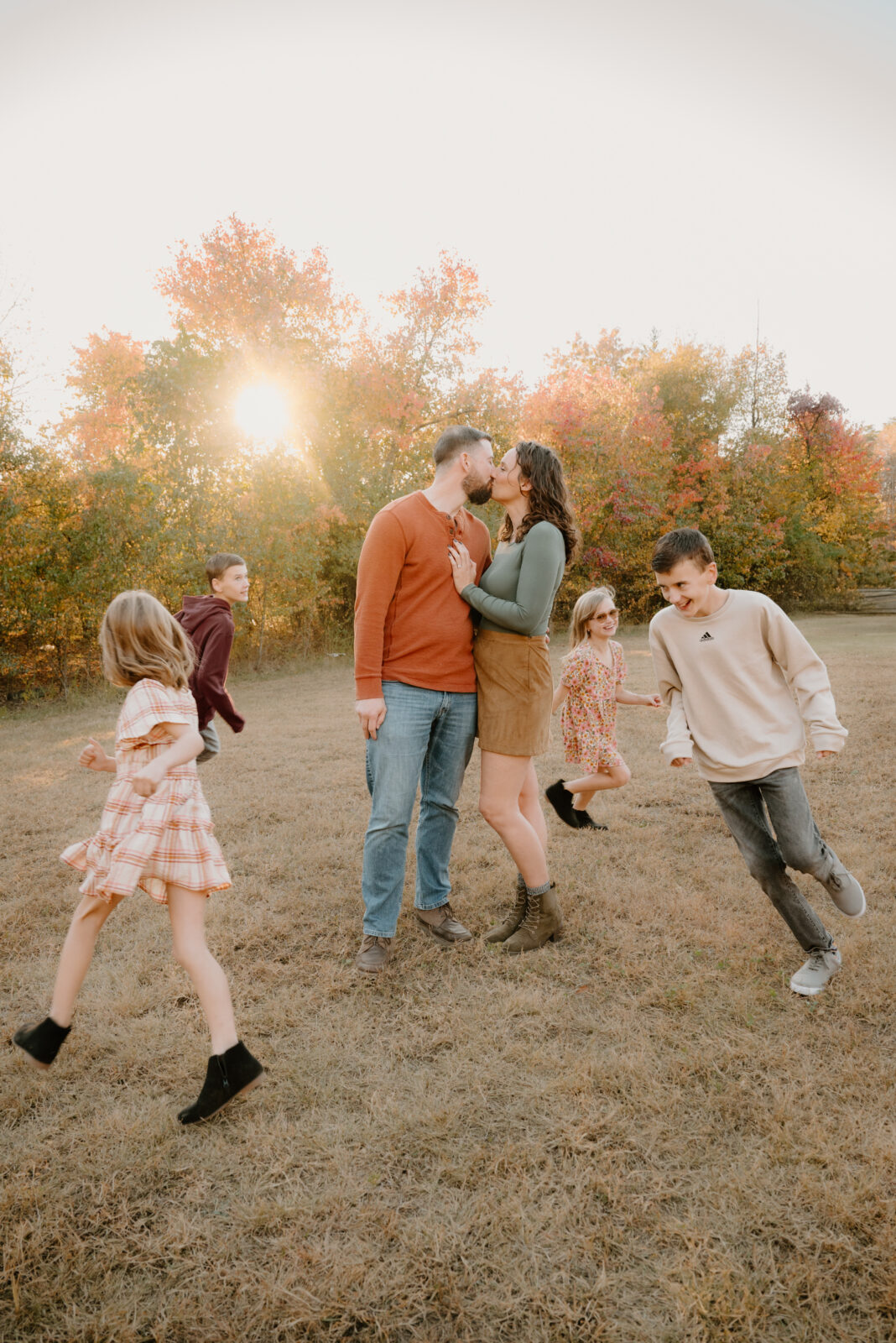Joyful, stress-free, candid family photography in Annapolis with parents and kids running and playing.